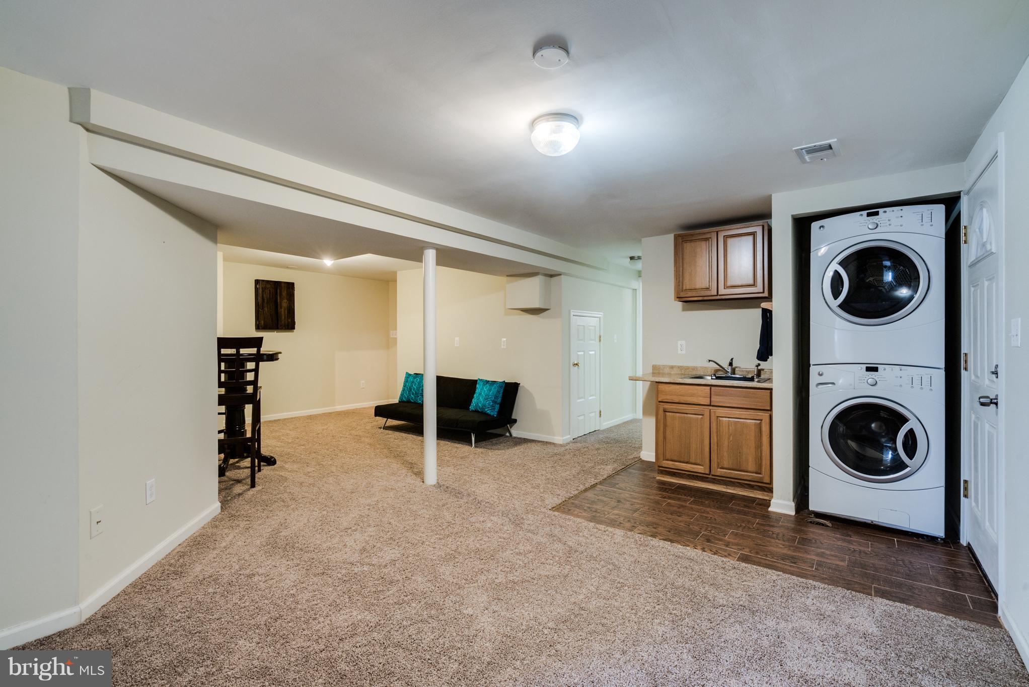 10303 Ridgemoor Drive Silver Spring, MD 20901 - Photo 22 of 29 a view of a livingroom with furniture and a ceiling fan