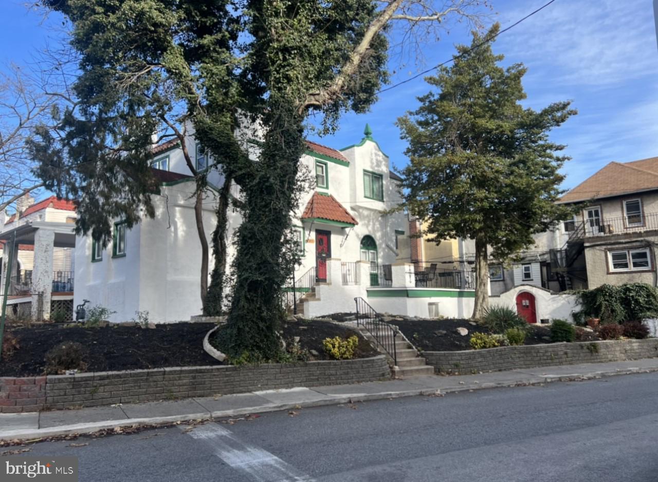 255 Shirley Road Upper Darby, PA 19082 - Photo 5 of 36 a front view of a house with a yard and tree s
