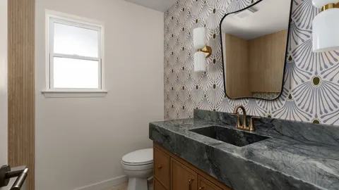 a bathroom with a sink and a toilet