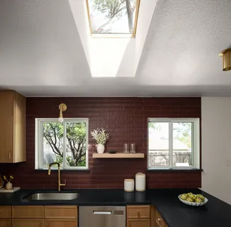 a kitchen with a sink and a window