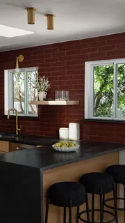 a kitchen with a table and chairs in it