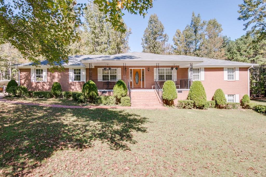 515 Harvey Lokey Road Bethlehem, GA 30620 - Photo 1 of 1 4-sided brick ranch with full finished basement on over 5 acres.