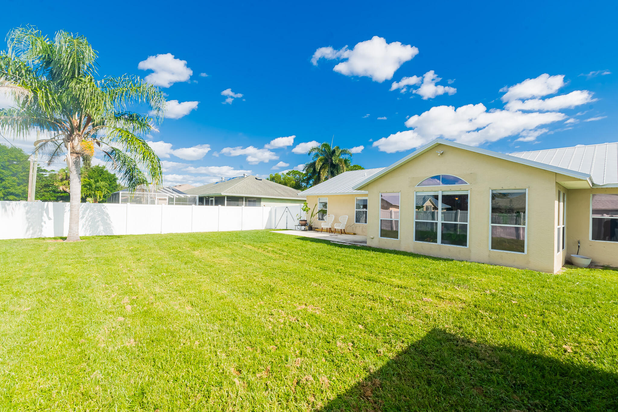 526 Southwest Dairy Road Port St. Lucie, FL 34953 - Photo 16 of 23 a view of a house with swimming pool