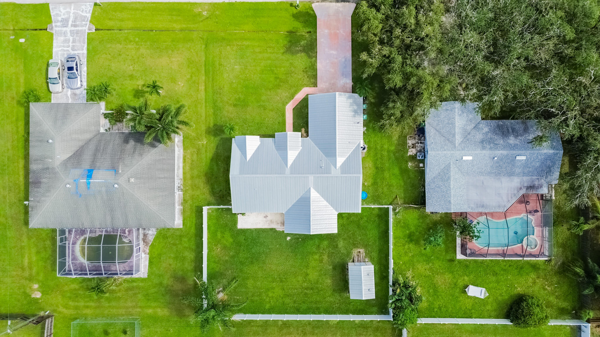 526 Southwest Dairy Road Port St. Lucie, FL 34953 - Photo 22 of 23 an aerial view of a house with a garden