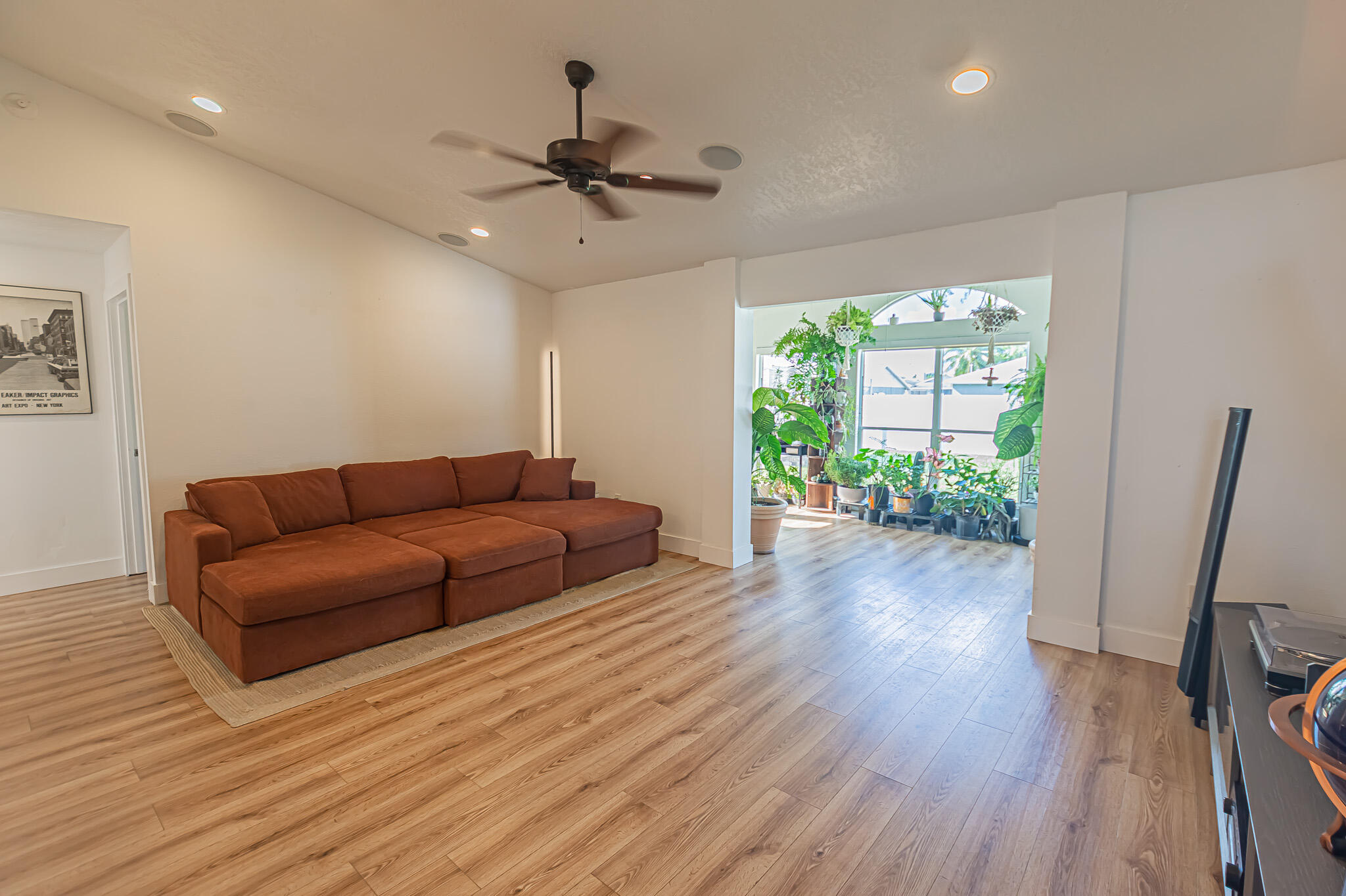 526 Southwest Dairy Road Port St. Lucie, FL 34953 - Photo 6 of 23 a living room with furniture and a large window