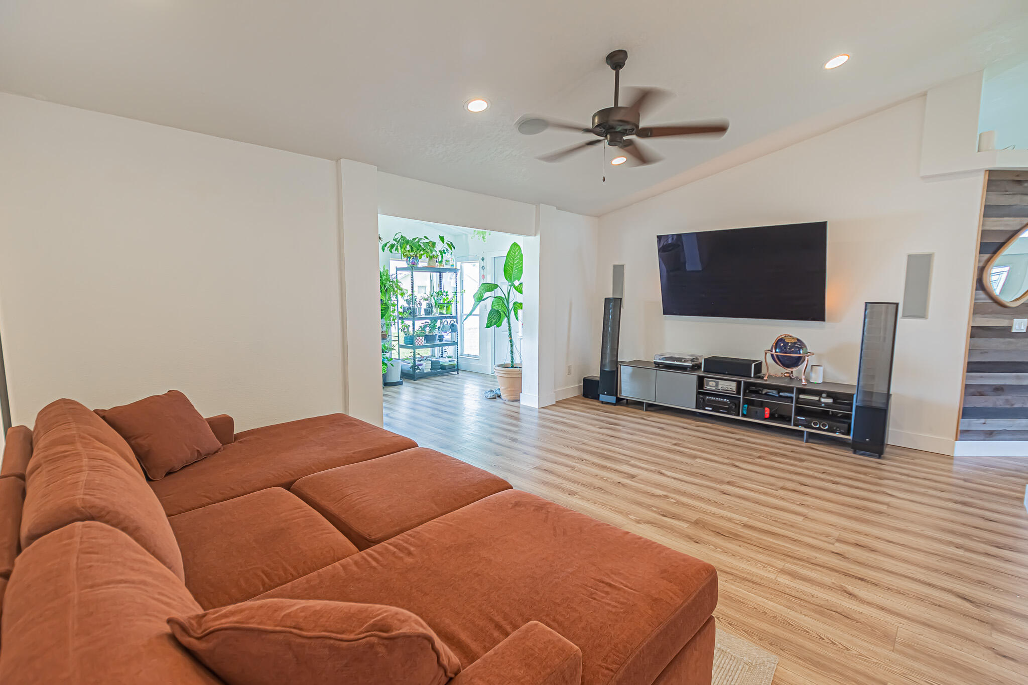 526 Southwest Dairy Road Port St. Lucie, FL 34953 - Photo 7 of 23 a living room with furniture and a flat screen tv