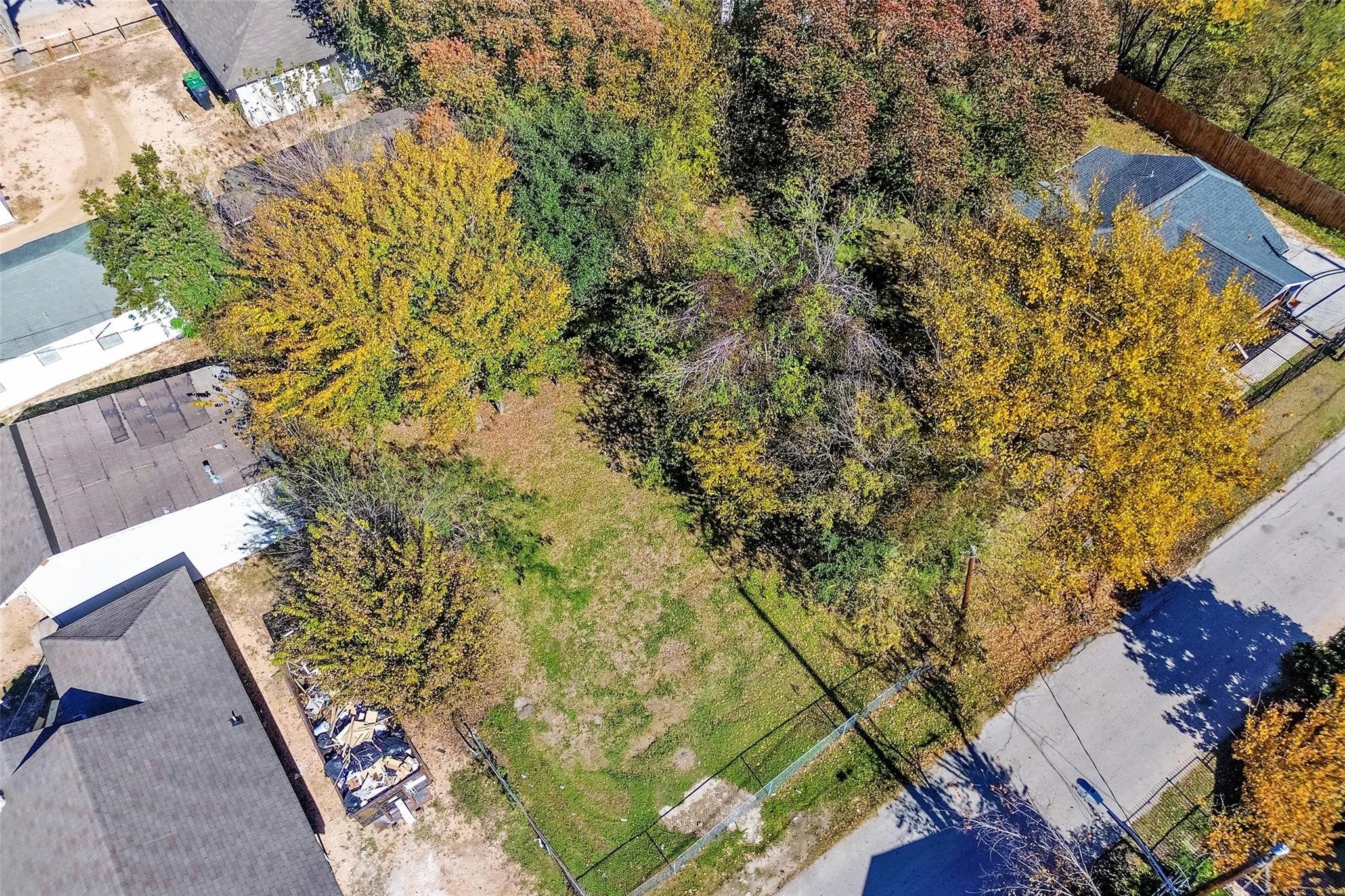 3209 Adelia Street Houston, TX 77026 - Photo 15 of 18 a view of a yard with plants and wooden fence