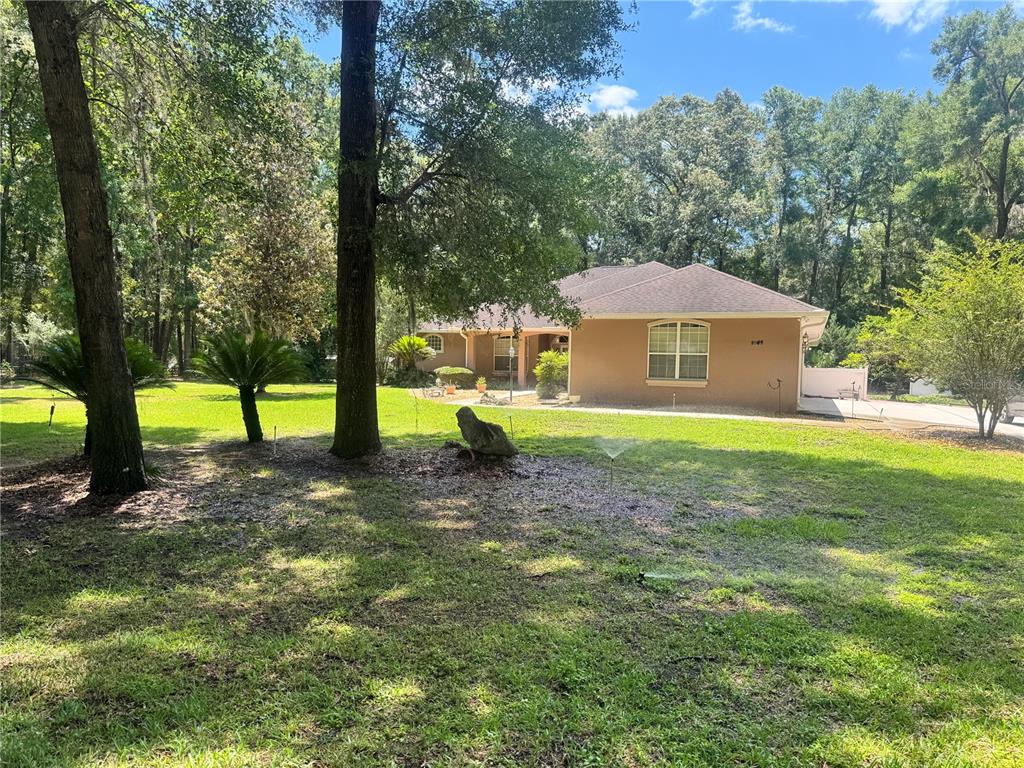 11145 Northwest 17th Court Road Ocala, FL 34475 - Photo 15 of 59 a view of a house with a yard