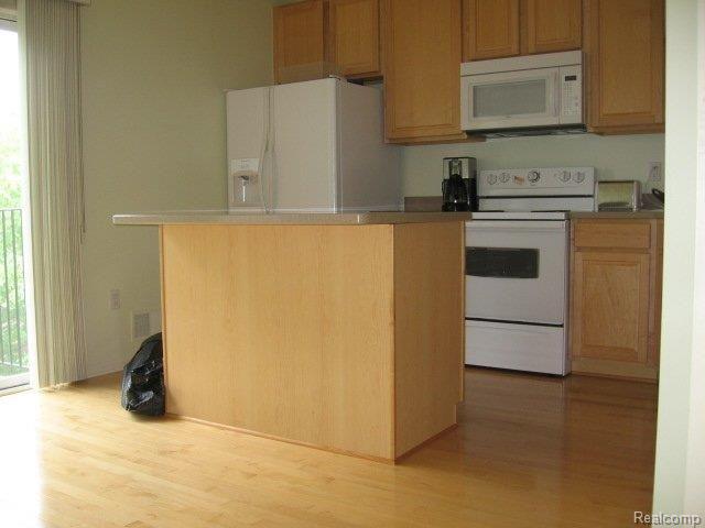 655 Cherry Orchard Road Canton, MI 48188 - Photo 8 of 12 KITCHEN WITH WOOD FLOORS