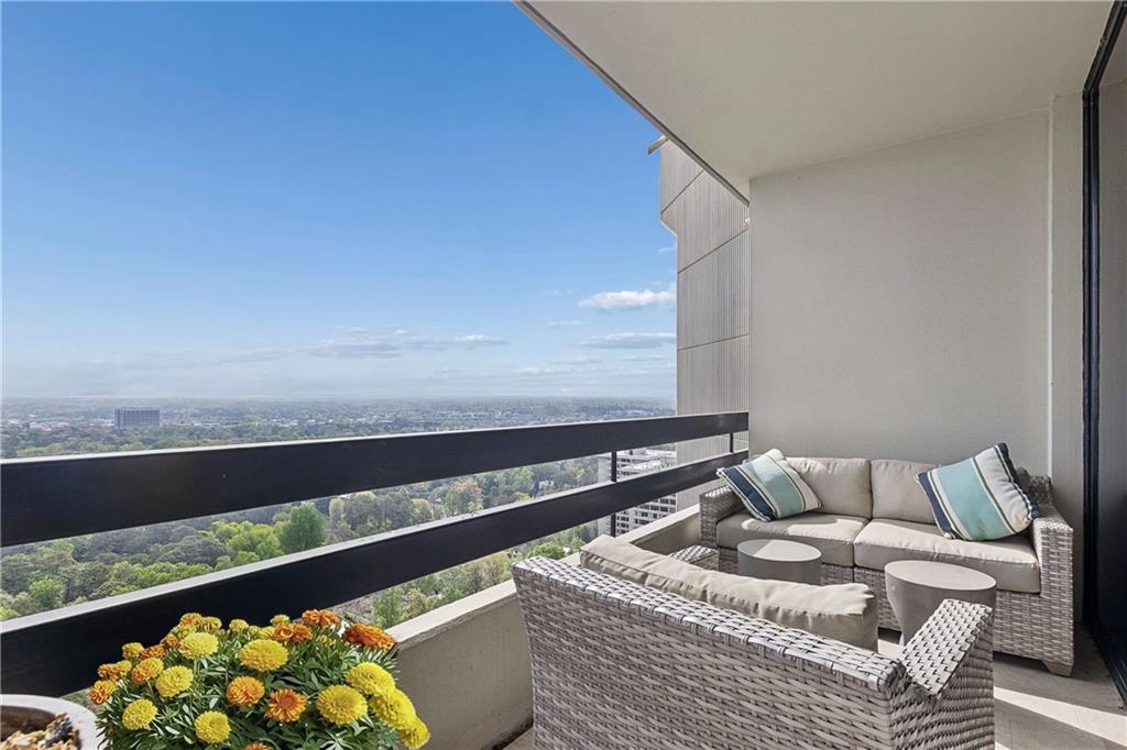2660 Peachtree Road Northwest, Unit 34F Atlanta, GA 30305 - Photo 34 of 57 a view of balcony with furniture