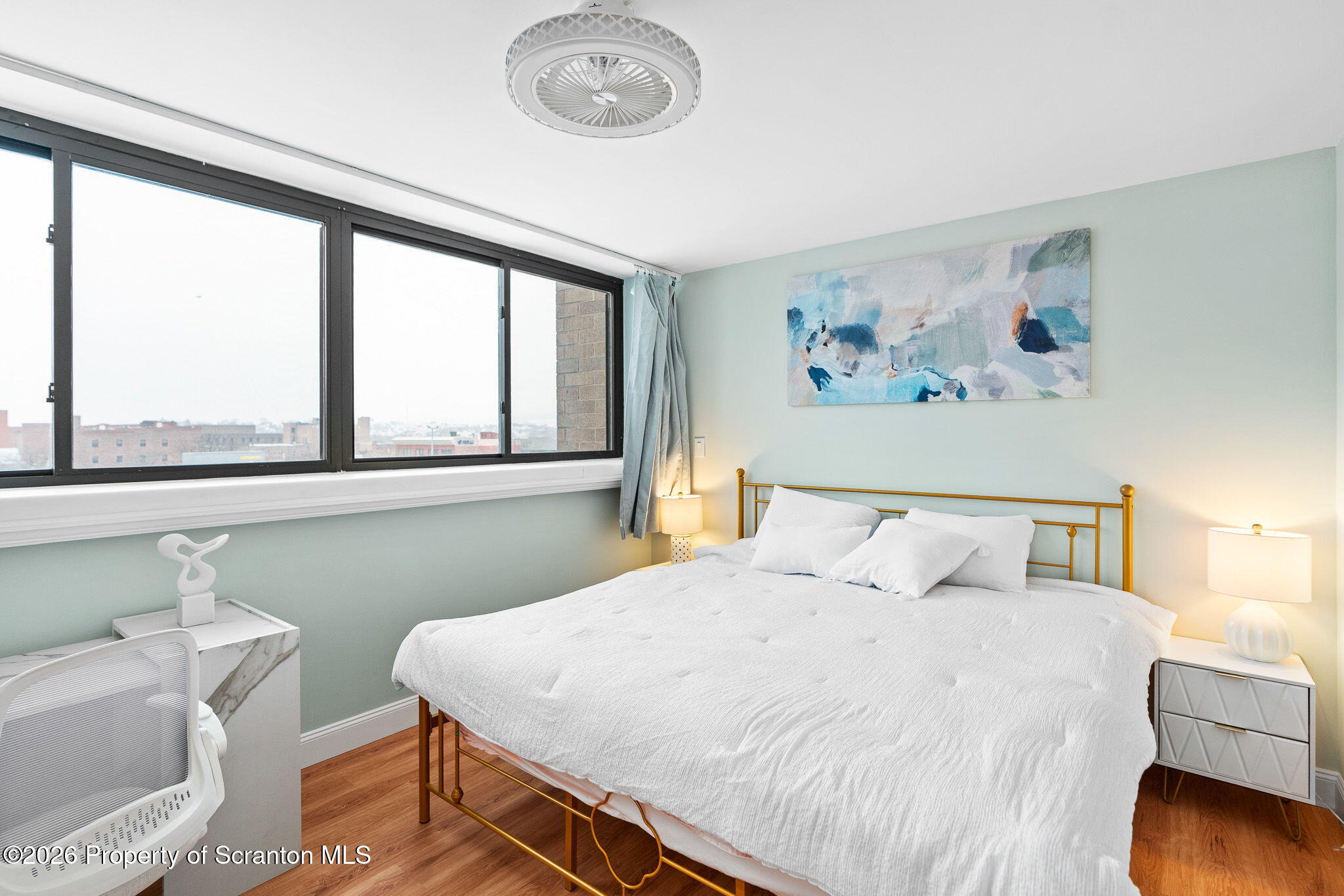 220 Linden Street, Unit 503 Scranton, PA 18503 - Photo 22 of 40 a bedroom with a bed and a large window