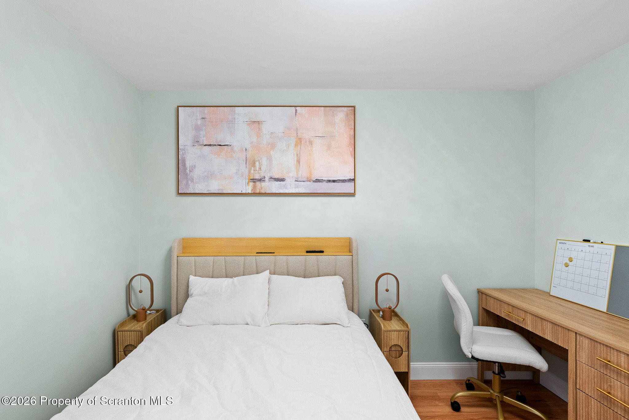 220 Linden Street, Unit 503 Scranton, PA 18503 - Photo 33 of 40 a bedroom with a bed and a desk