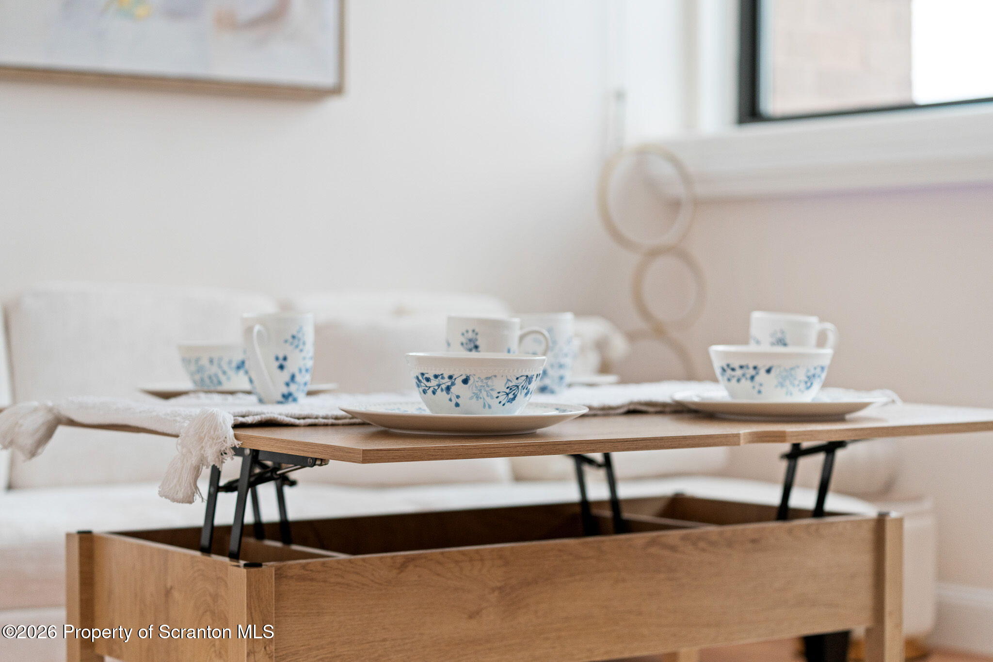220 Linden Street, Unit 503 Scranton, PA 18503 - Photo 5 of 40 a room with a table chairs and entryway