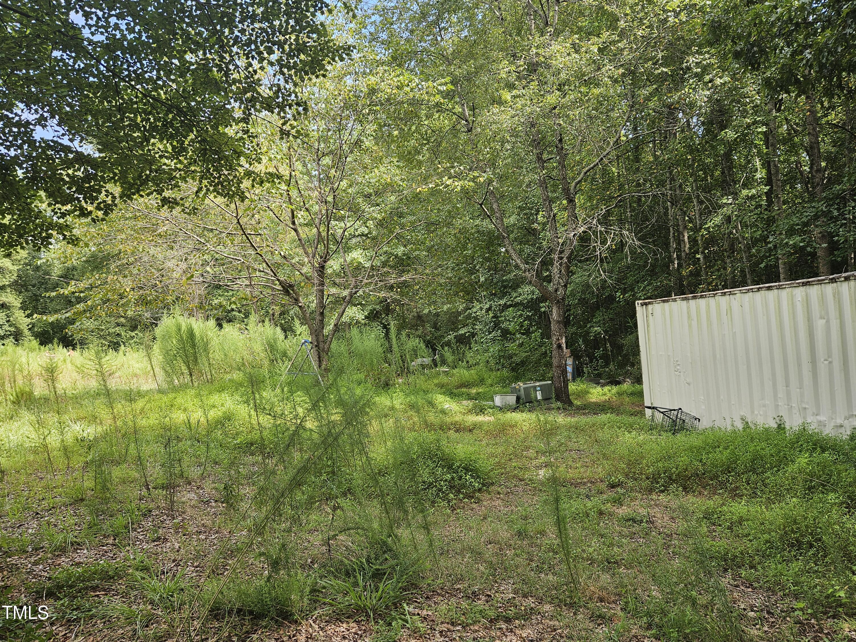 1049 Graham Pond Road Angier, NC 27501 - Photo 10 of 18 a view of a garden