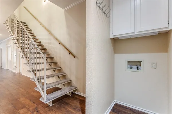 a view of entryway with wooden floor