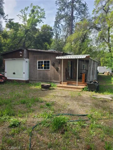a house with trees in front of it