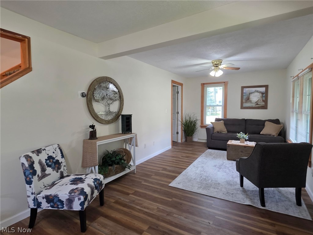 2335 West River Road Newton Falls, OH 44444 - Photo 6 of 36 Living area featuring wood-finish flooring and light-toned walls