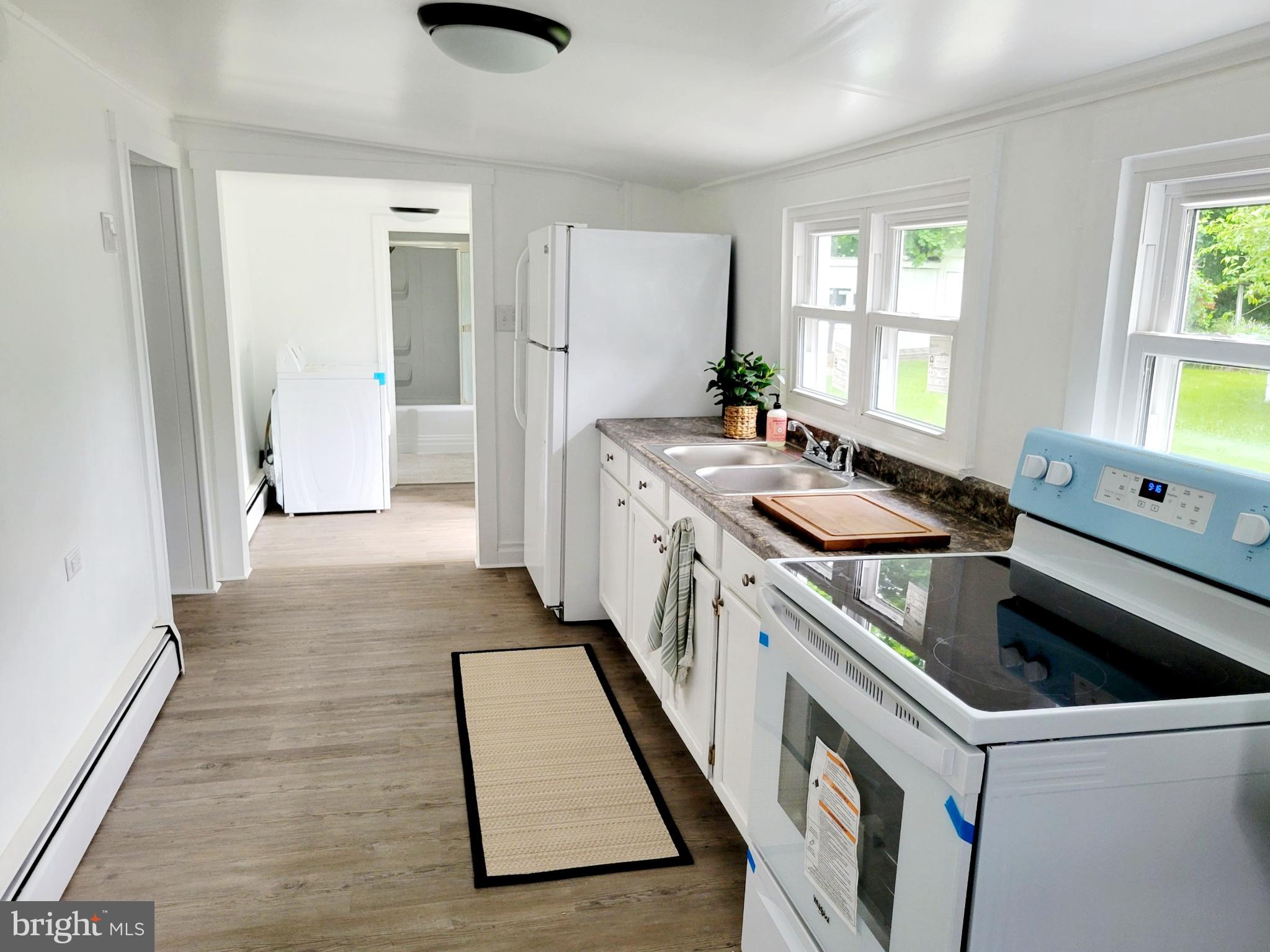 12013 Mapleville Road Cavetown, MD 21783 - Photo 6 of 25 Kitchen - new range and refrigerator