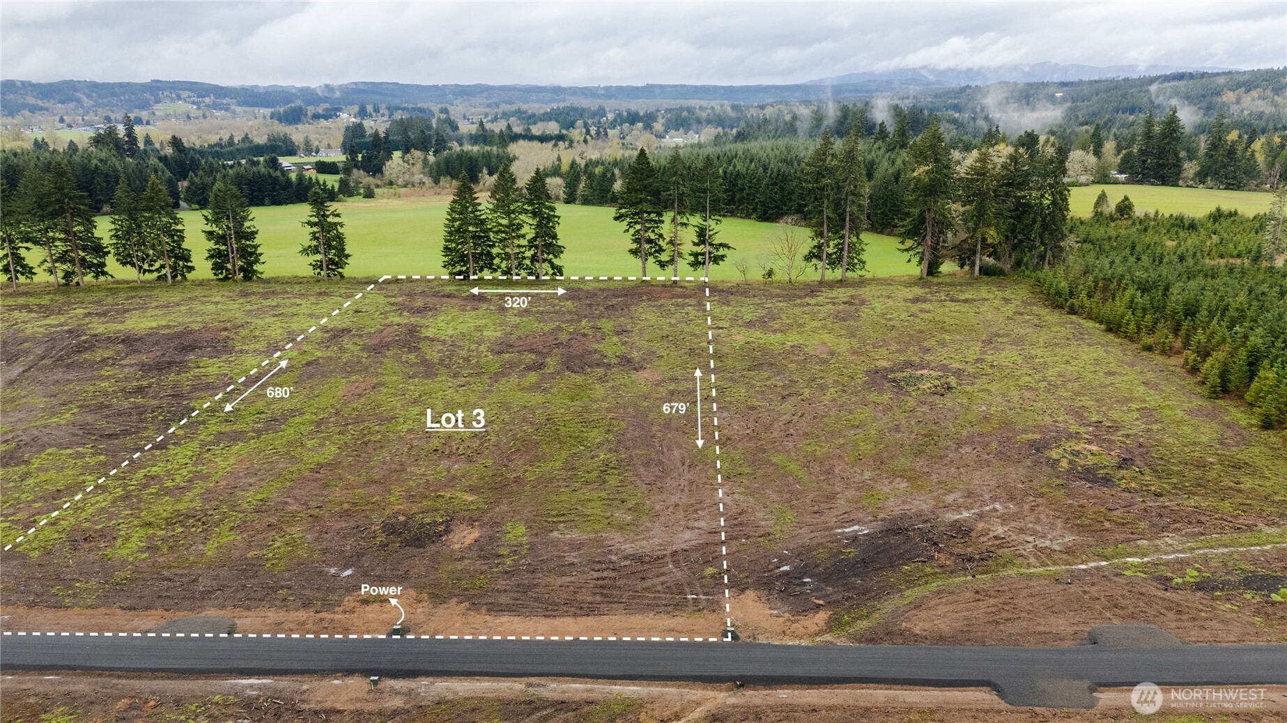 121 Beckett Lane Chehalis, WA 98532 - Photo 2 of 25 a view of a lake with a mountain in the back