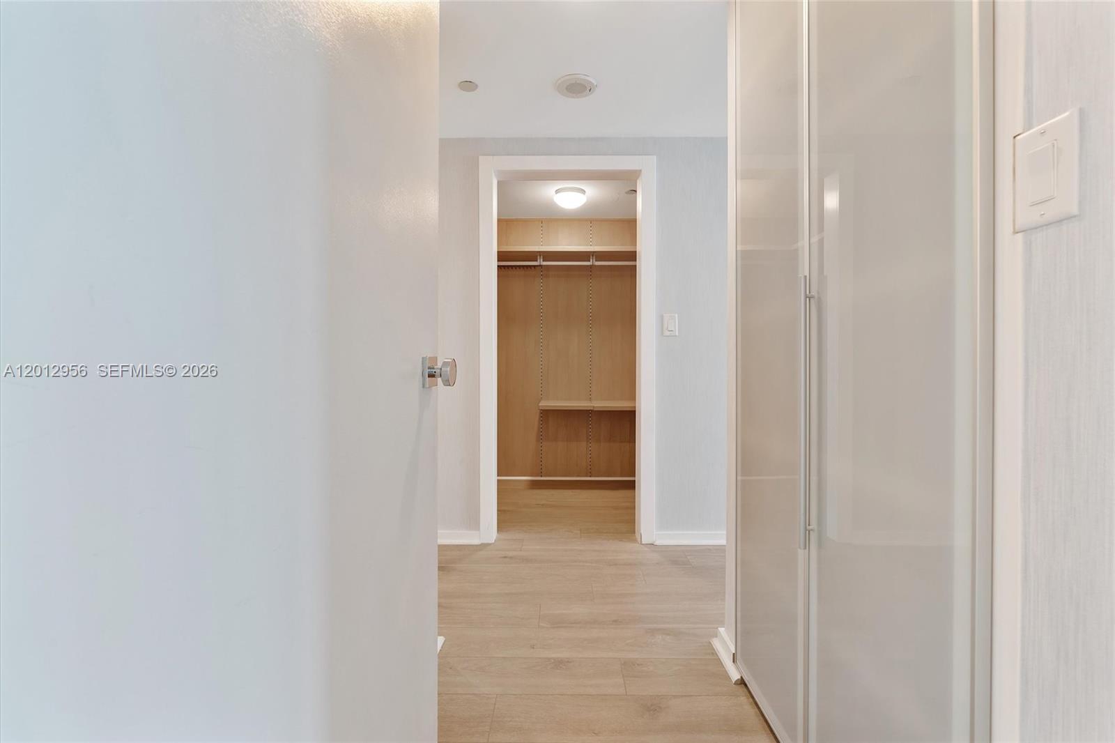 9401 Collins Avenue, Unit 505 Surfside, FL 33154 - Photo 14 of 39 a view of a hallway