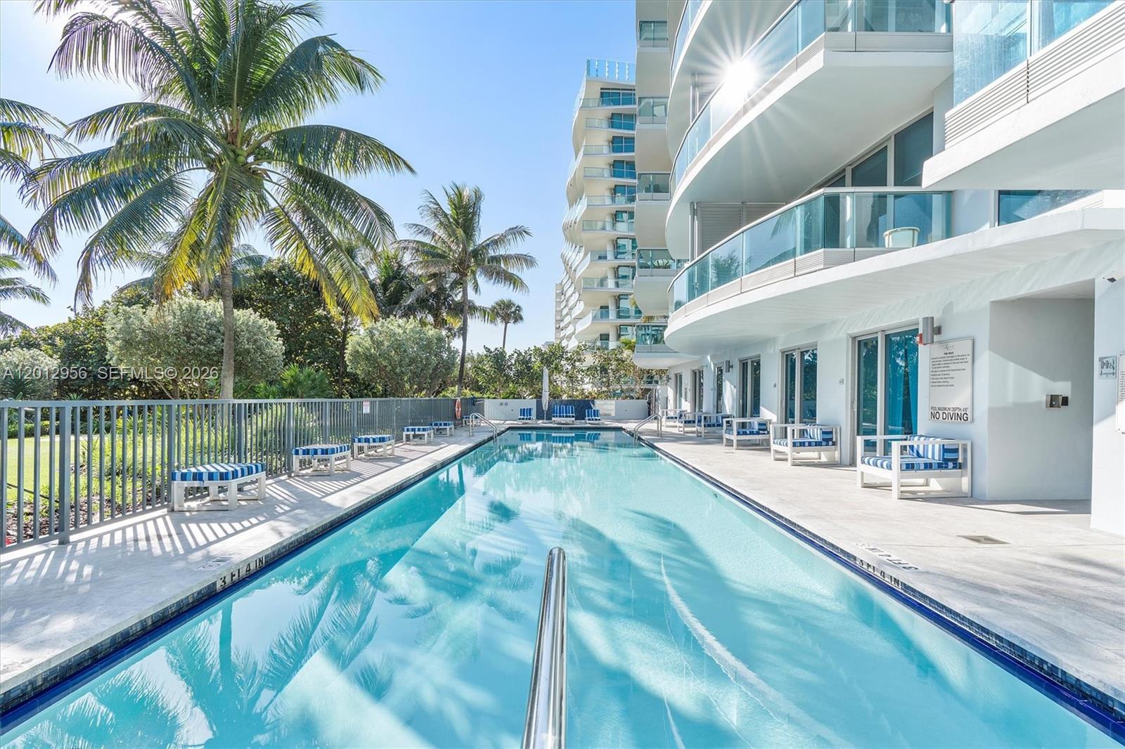 9401 Collins Avenue, Unit 505 Surfside, FL 33154 - Photo 36 of 39 a view of a house with swimming pool