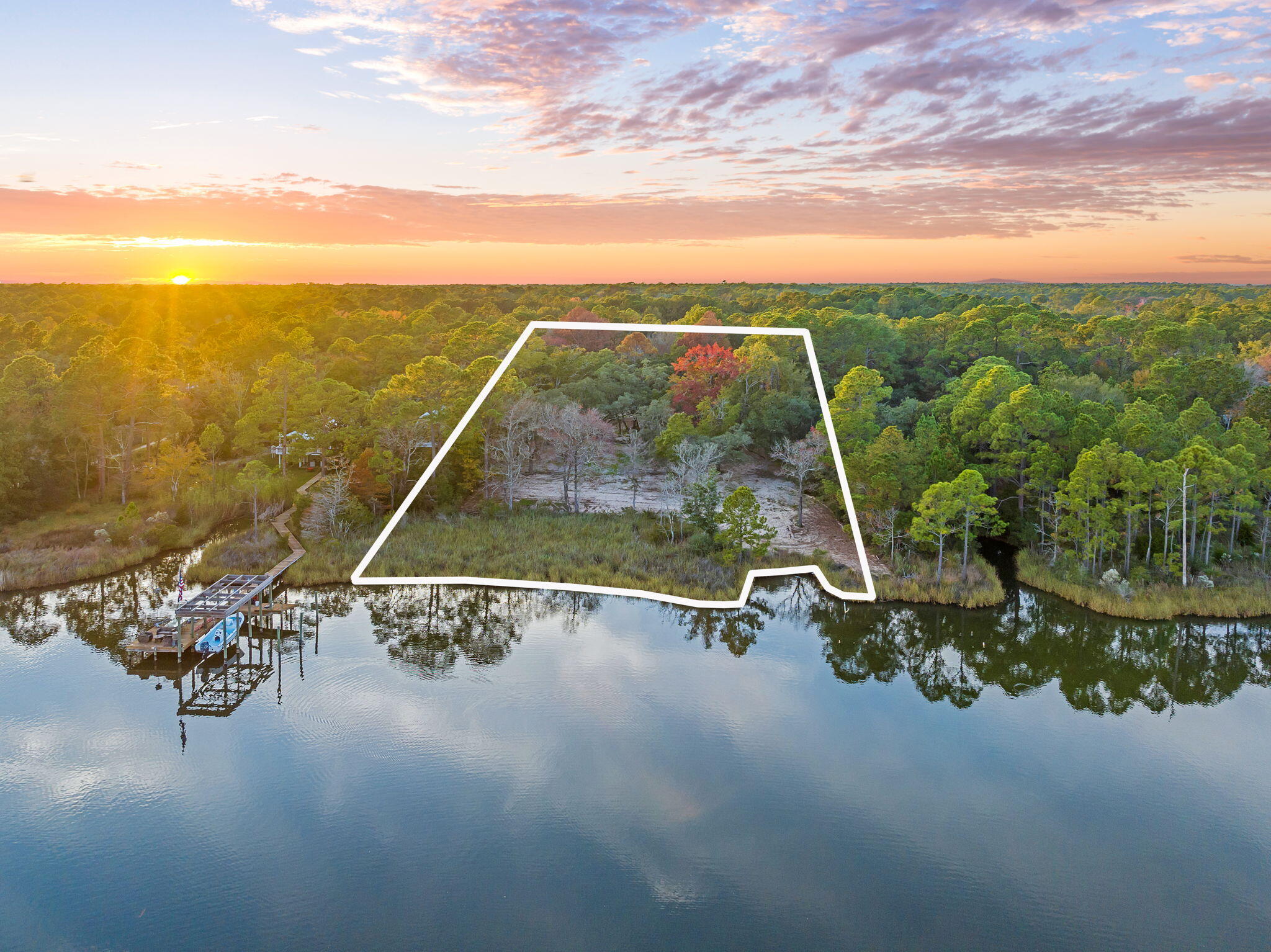 Tbd Whitfield Road Freeport, FL 32439 - Photo 2 of 5 a view of a swimming pool with a yard and sitting area