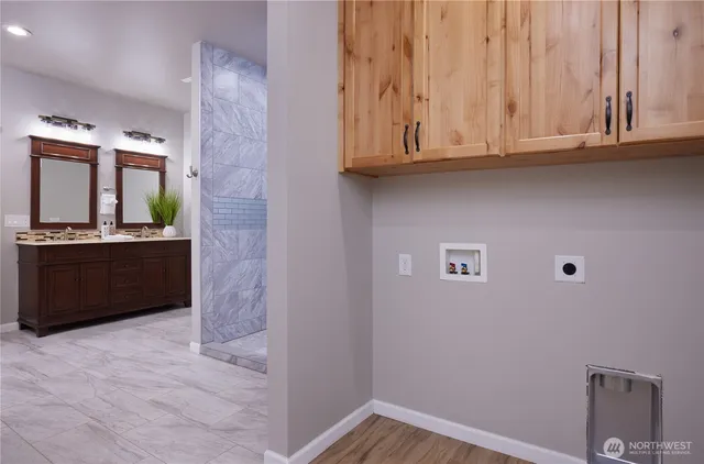 a view of cabinets and wooden floor