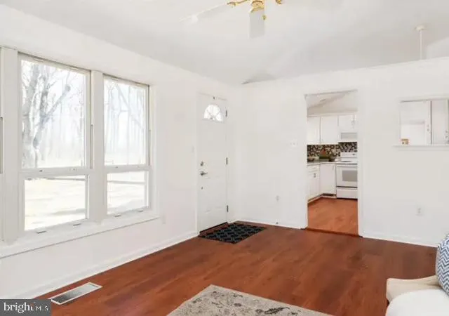 a bedroom with a bed and dresser