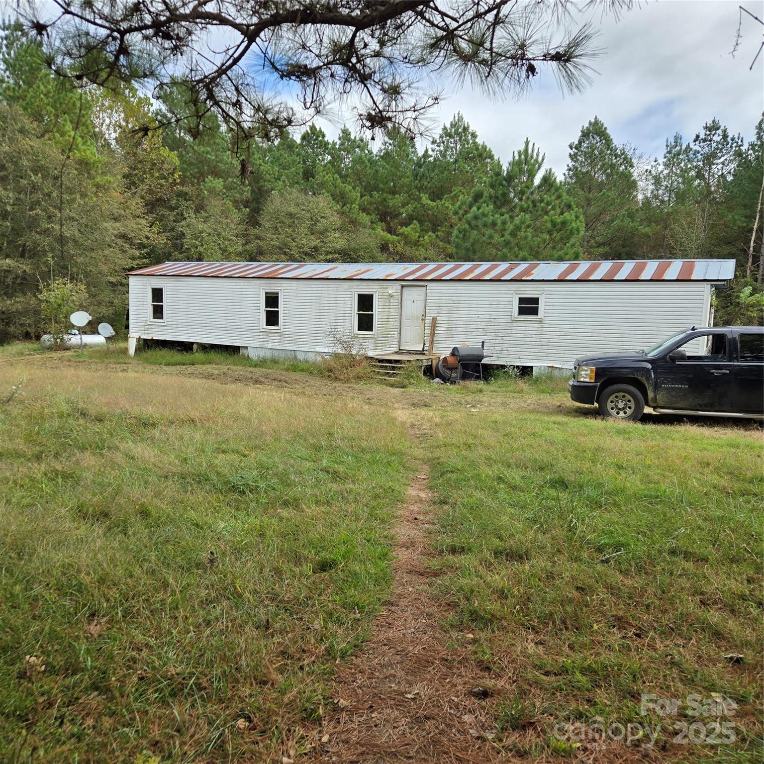 2955 Wrenn Road Prospect Hill, NC 27314 - Photo 12 of 18 a view of a backyard