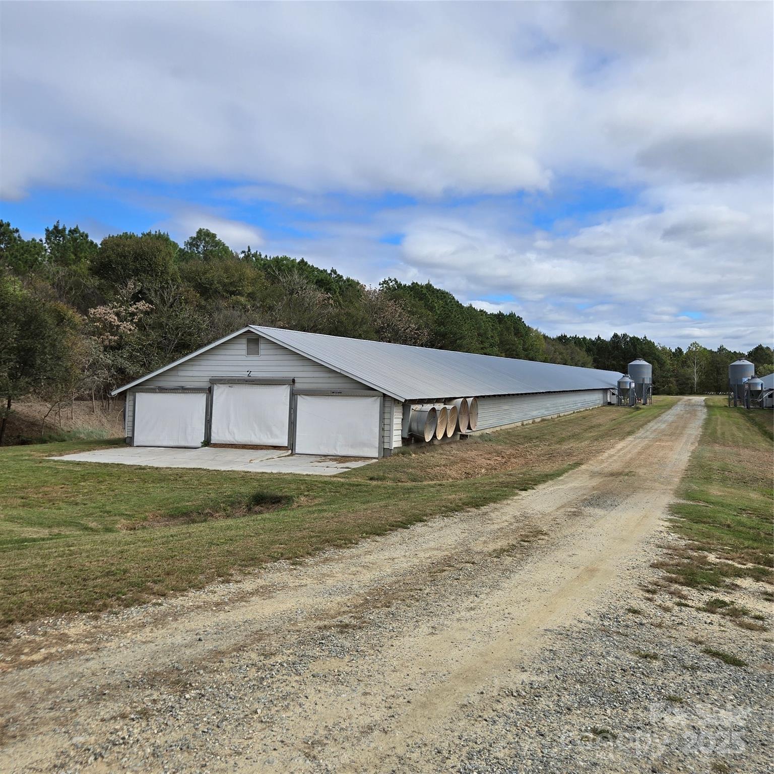 2955 Wrenn Road Prospect Hill, NC 27314 - Photo 2 of 18 a view of big house with a big yard
