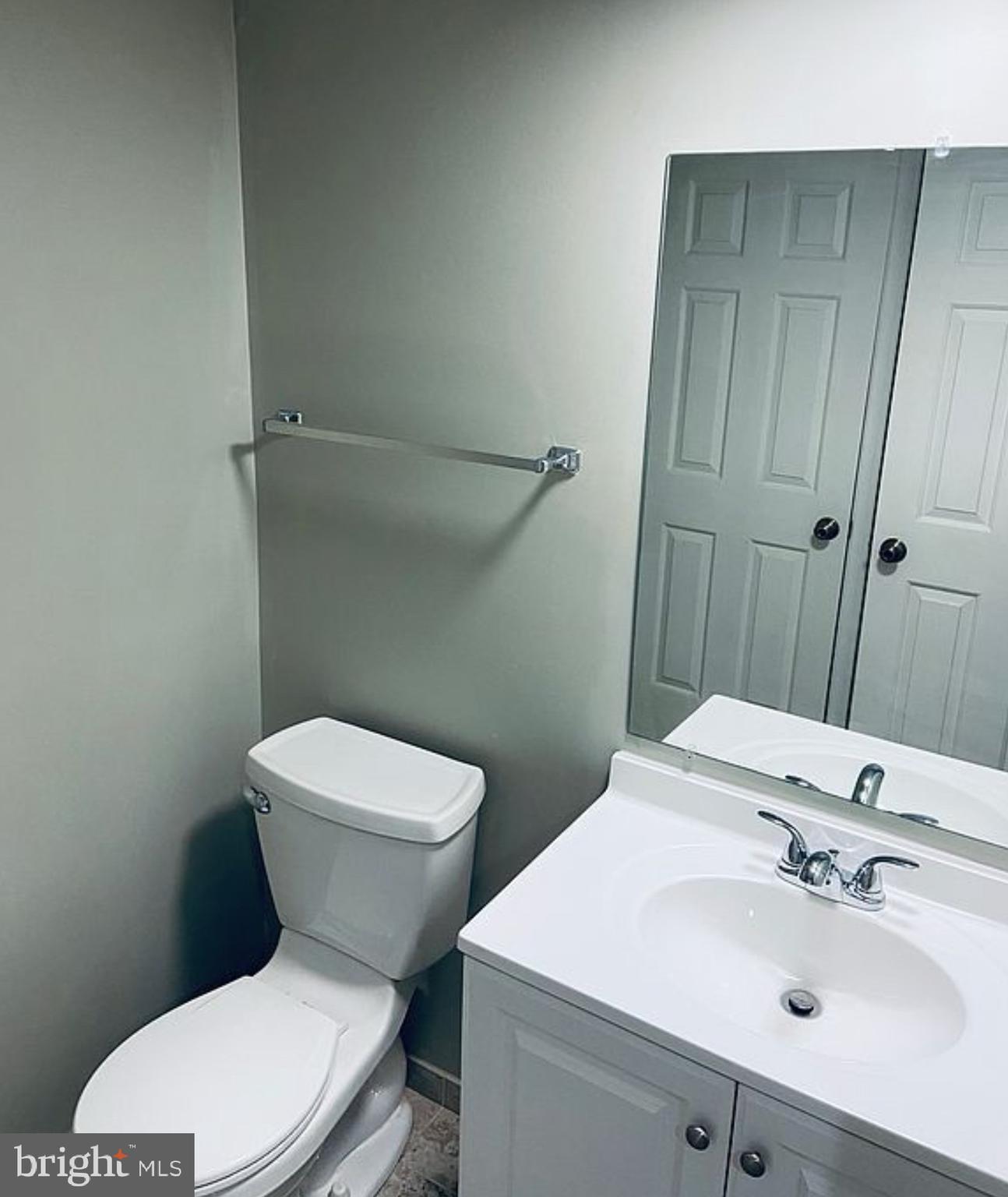 52 Cabot Drive Chesterbrook, PA 19087 - Photo 15 of 15 a white toilet sitting next to a bathroom sink
