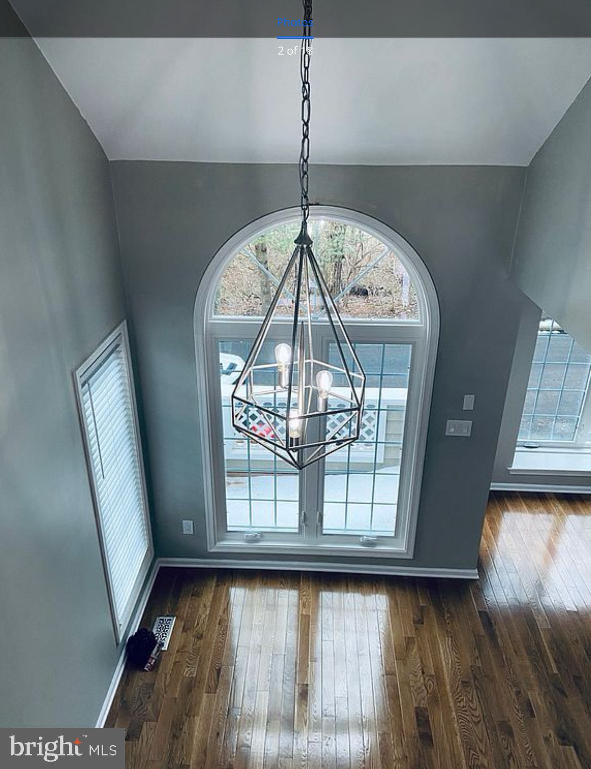 52 Cabot Drive Chesterbrook, PA 19087 - Photo 4 of 15 a view of a hallway with a chandelier