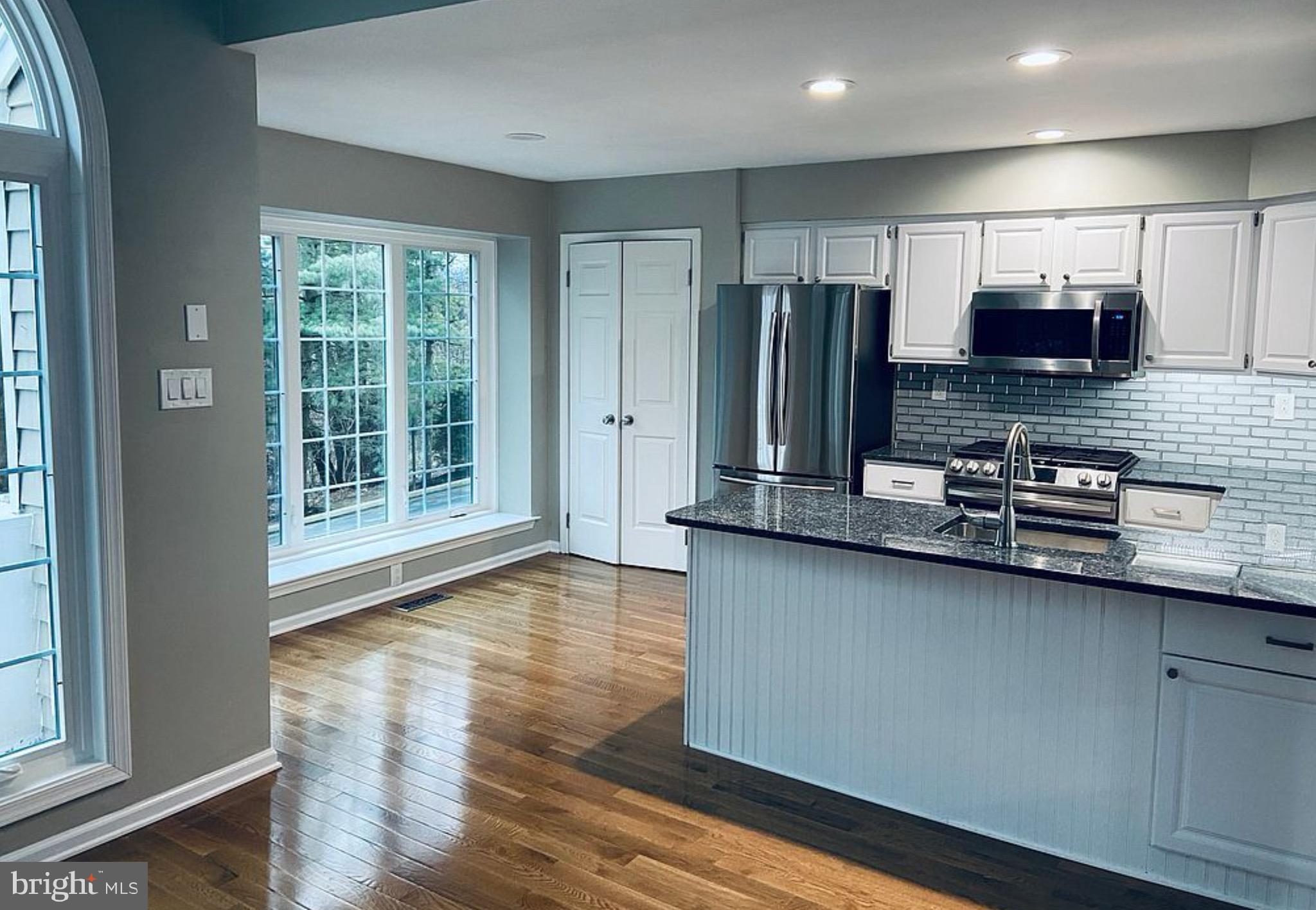 52 Cabot Drive Chesterbrook, PA 19087 - Photo 5 of 15 a view of kitchen with stainless steel appliances granite countertop a stove a sink and a refrigerator
