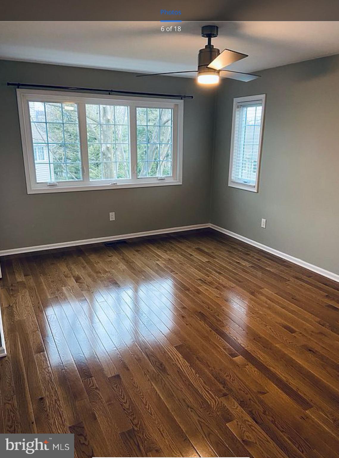 52 Cabot Drive Chesterbrook, PA 19087 - Photo 8 of 15 a view of an empty room with wooden floor and a window