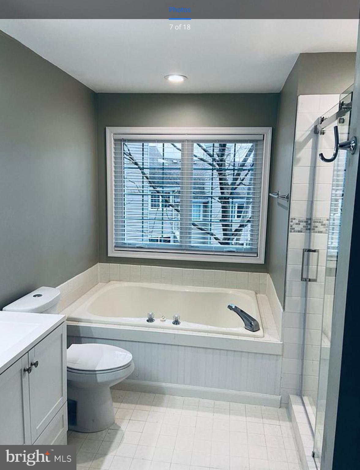 52 Cabot Drive Chesterbrook, PA 19087 - Photo 9 of 15 a bathroom with a bathtub and a window