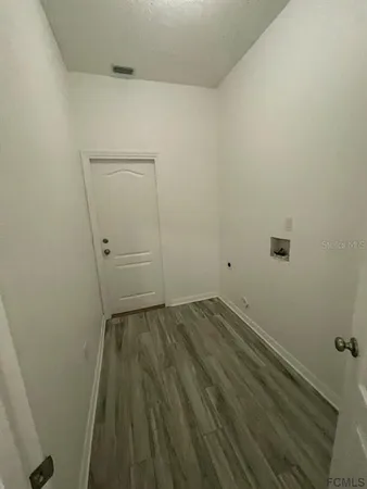 a view of small space with wooden floor