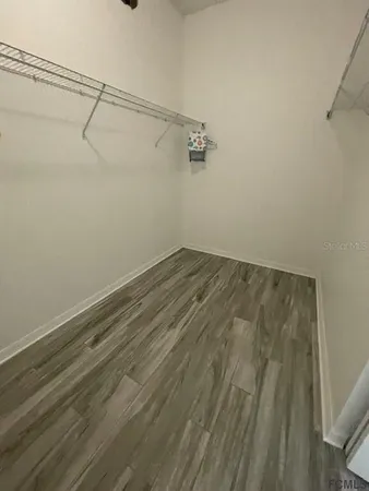 a view of a room with racks on the wall