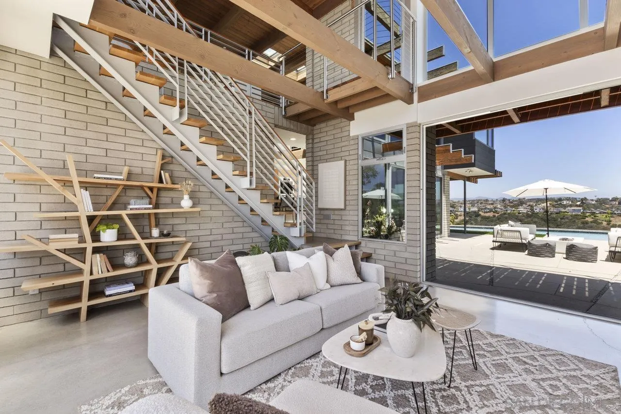 1635 Gascony Road Encinitas, CA 92024 - Photo 14 of 41 a living room with furniture and a large window