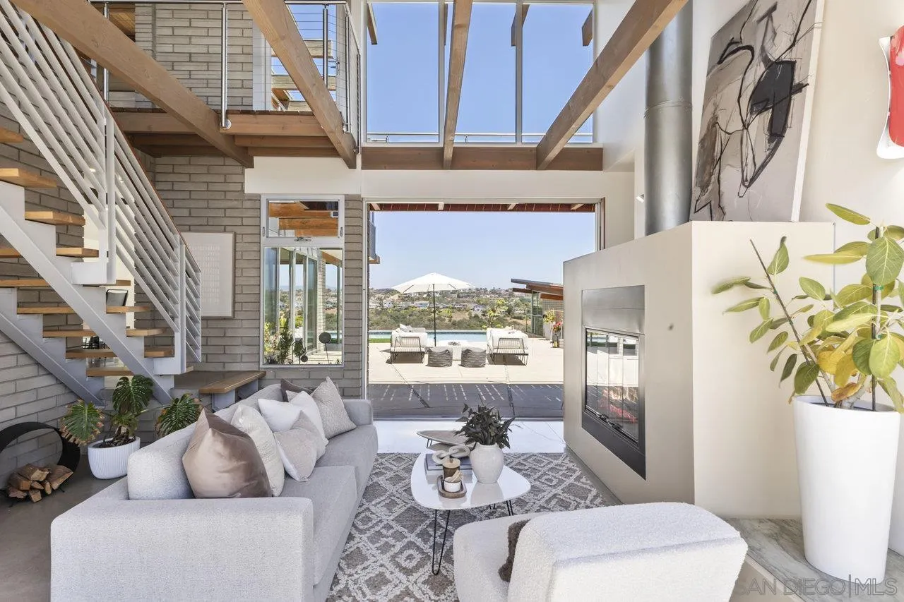 1635 Gascony Road Encinitas, CA 92024 - Photo 15 of 41 a living room with furniture and a potted plant