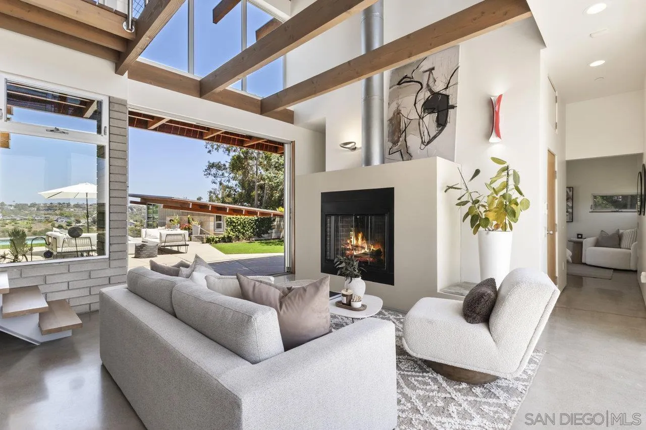 1635 Gascony Road Encinitas, CA 92024 - Photo 16 of 41 a living room with furniture and a flat screen tv