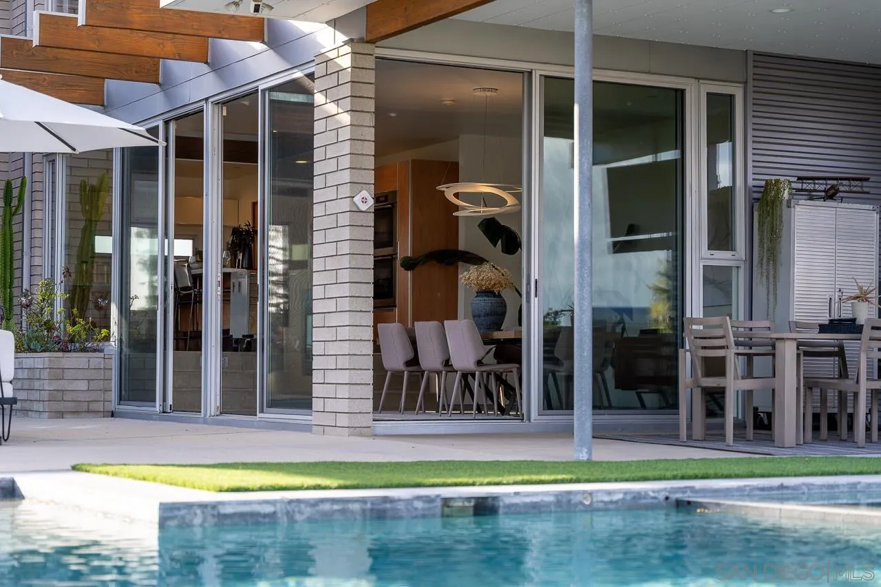 1635 Gascony Road Encinitas, CA 92024 - Photo 25 of 41 a view of a house with a swimming pool