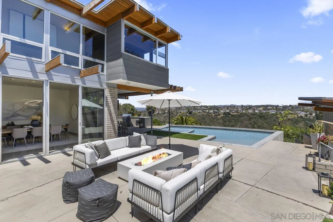 1635 Gascony Road Encinitas, CA 92024 - Photo 27 of 41 a view of a patio with couches and a table and chairs