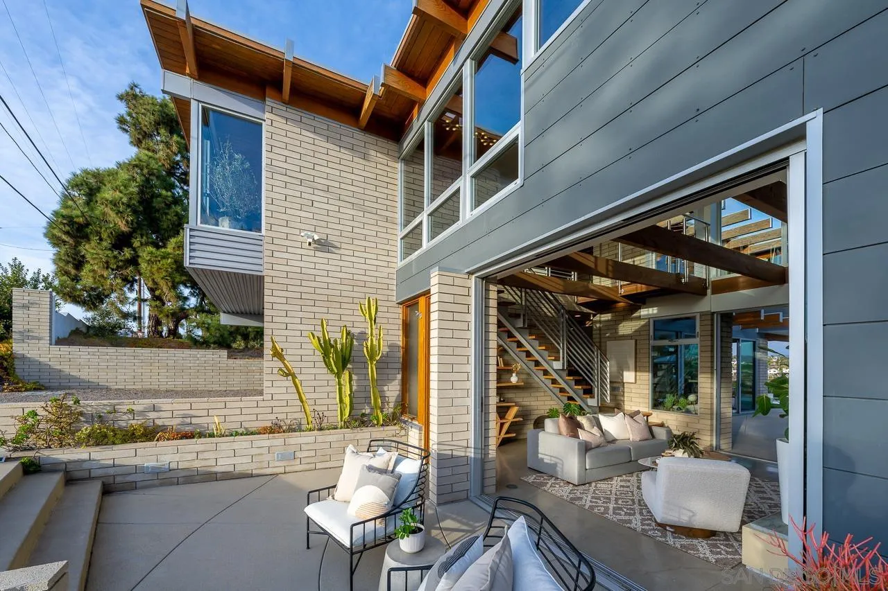 1635 Gascony Road Encinitas, CA 92024 - Photo 32 of 41 a view of a patio with table and chairs and potted plants