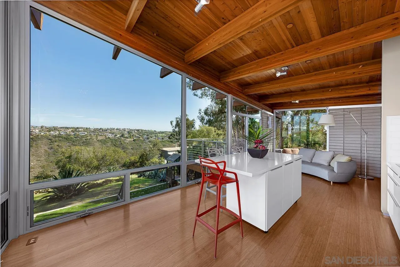 1635 Gascony Road Encinitas, CA 92024 - Photo 34 of 41 a sitting area with furniture and wooden deck