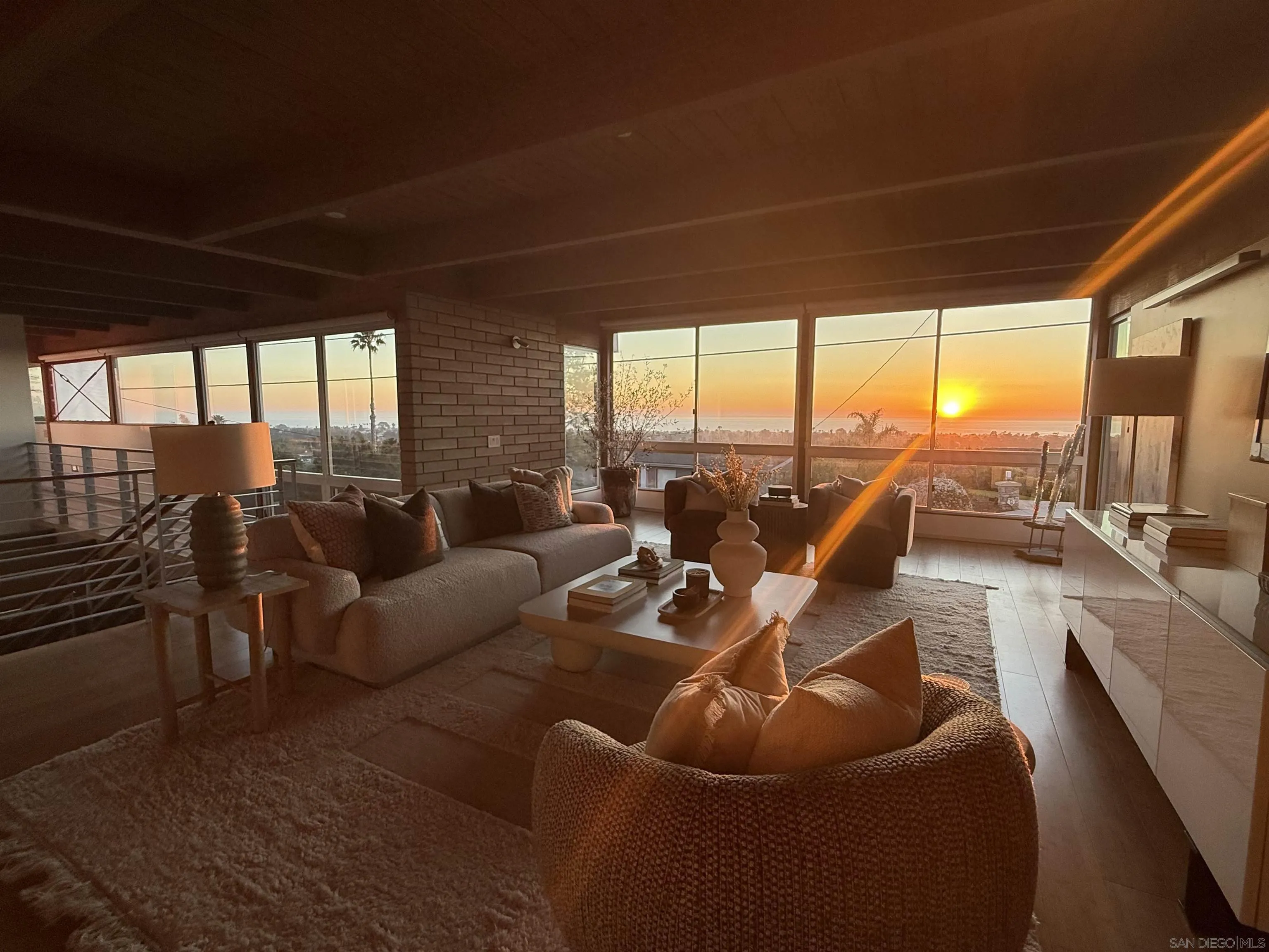 1635 Gascony Road Encinitas, CA 92024 - Photo 4 of 41 a living room with furniture and floor to ceiling windows