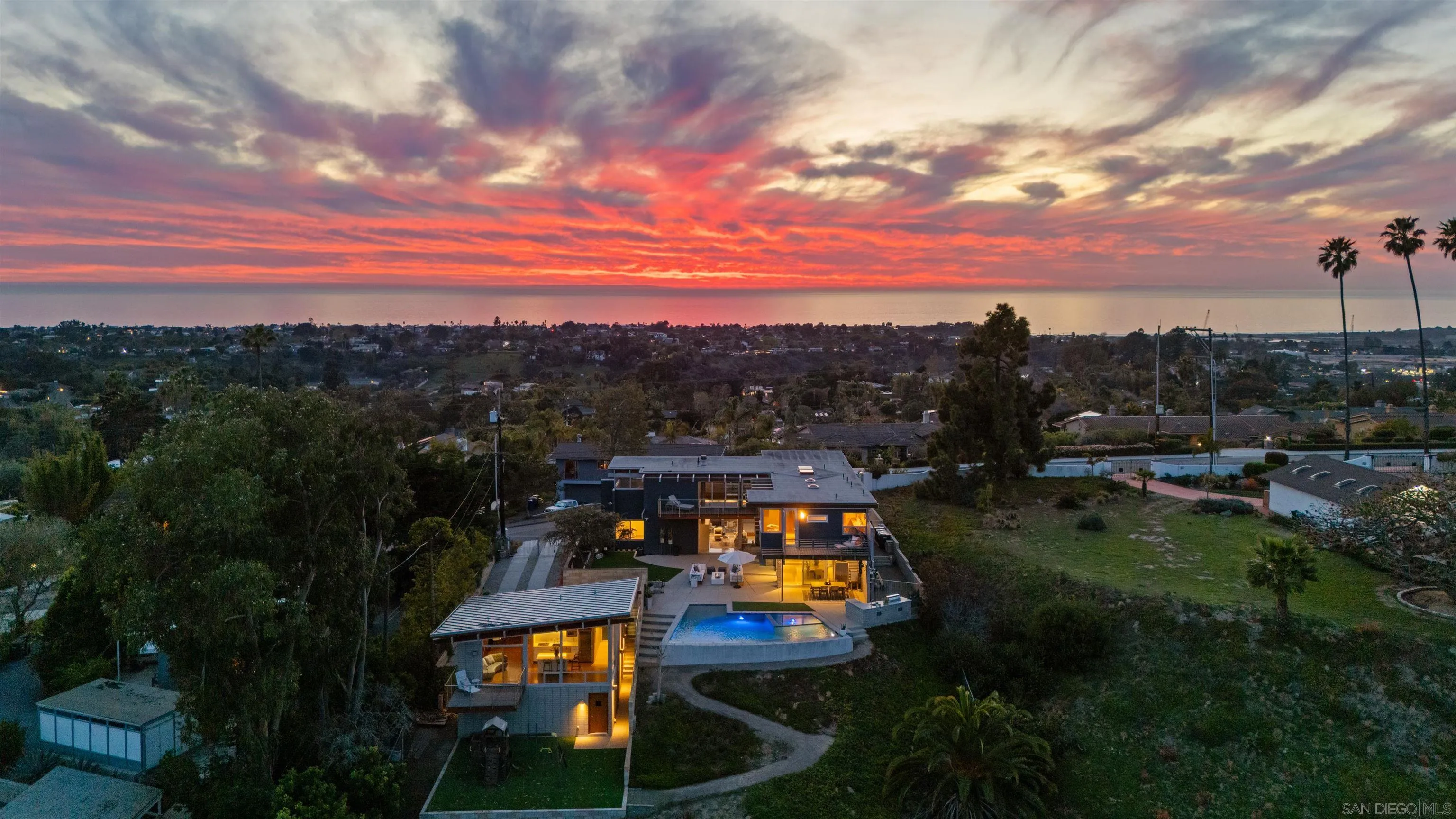 1635 Gascony Road Encinitas, CA 92024 - Photo 41 of 41 a view of a city with lots of residential buildings ocean and mountain view in back