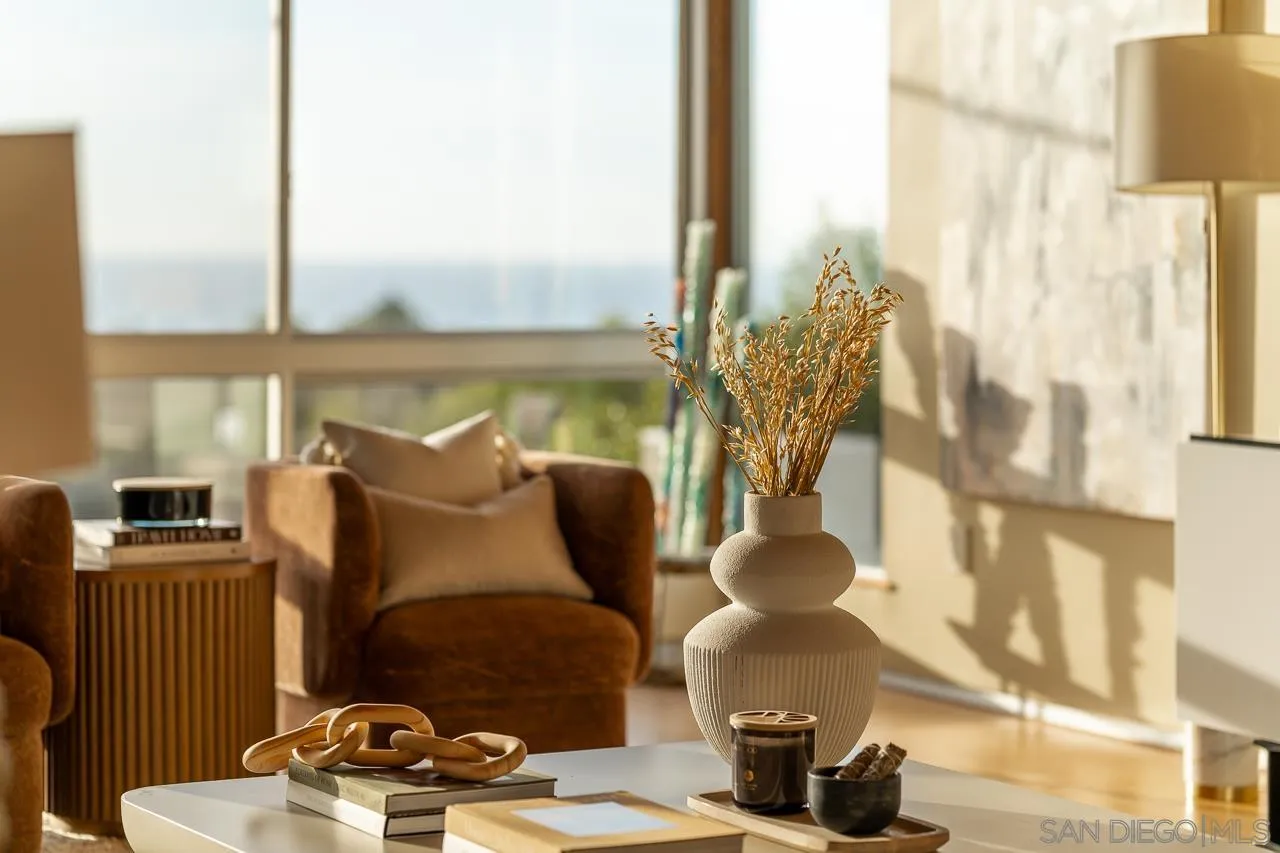 1635 Gascony Road Encinitas, CA 92024 - Photo 5 of 41 a bedroom with furniture and a large window