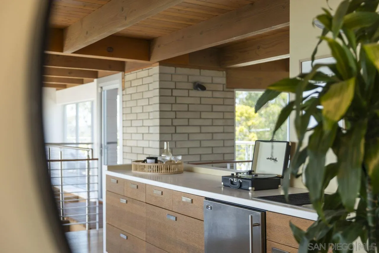 1635 Gascony Road Encinitas, CA 92024 - Photo 7 of 41 a bathroom with a sink and a mirror