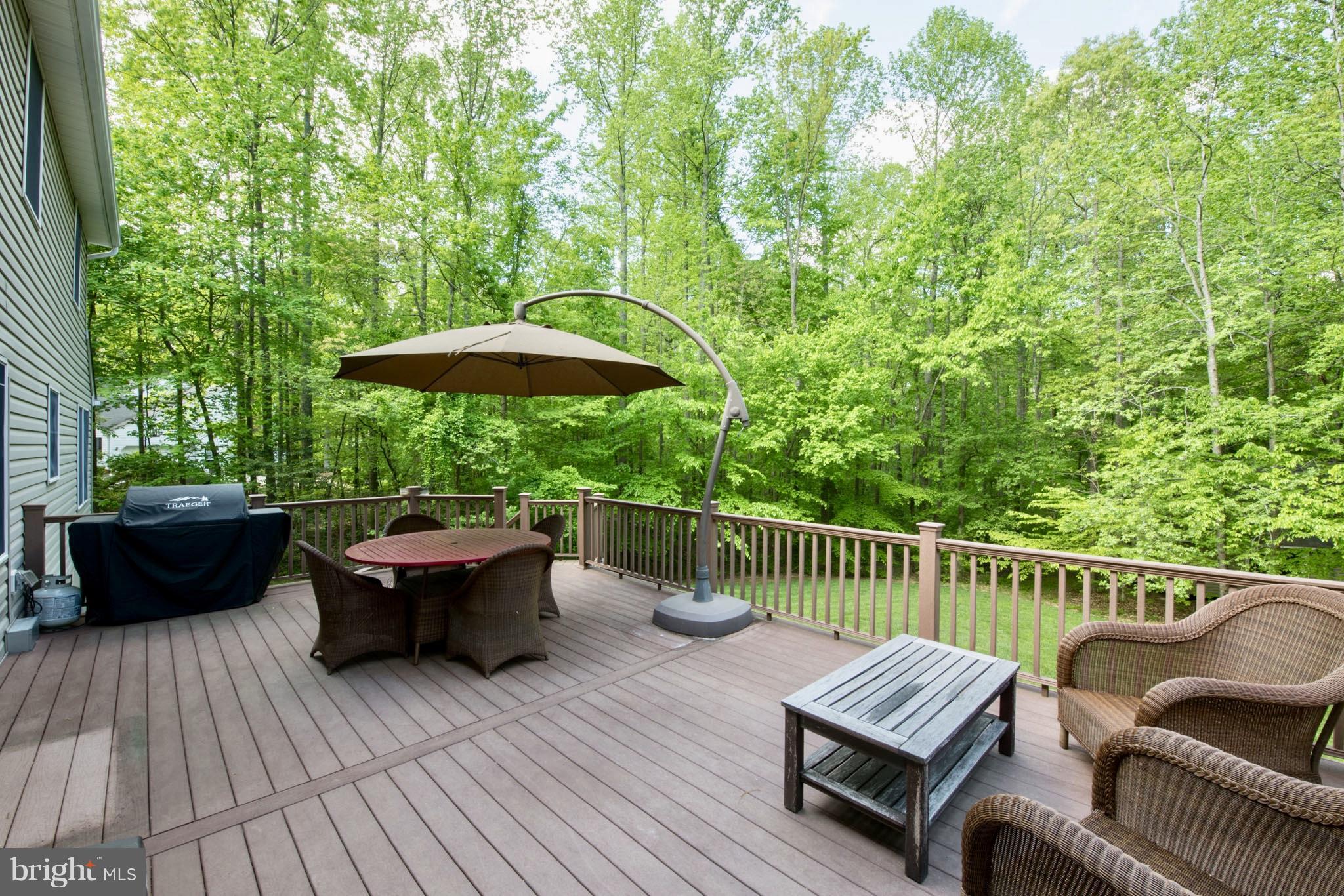 780 Carson Road Huntingtown, MD 20639 - Photo 8 of 30 Maintenance Free Decking Overlooking Flat Yard
