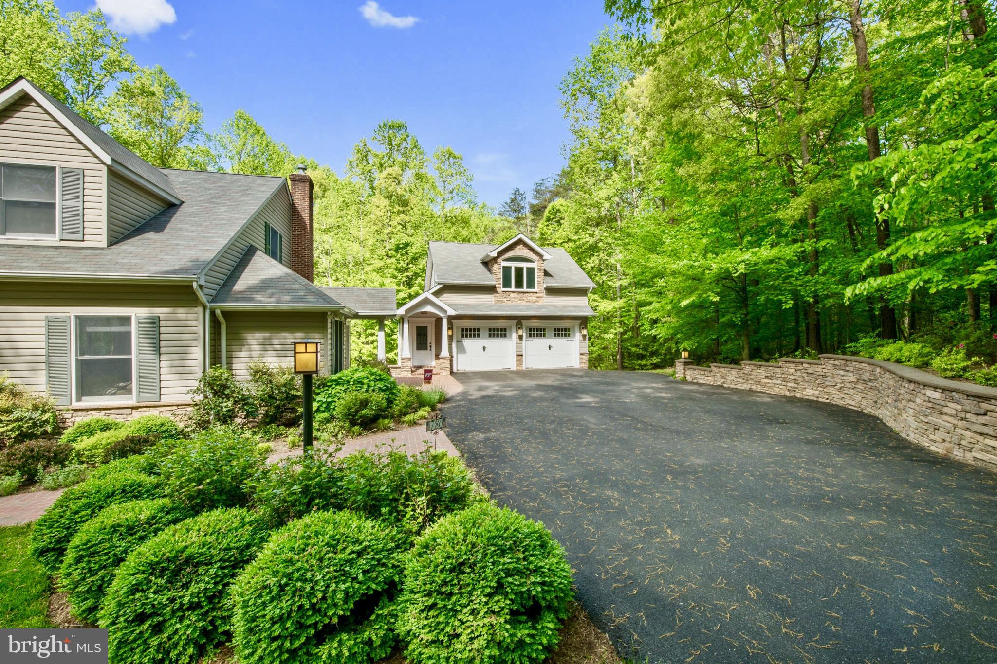 780 Carson Road Huntingtown, MD 20639 - Photo 10 of 30 Walkout To Stunning Brick Work And 4 Car Garage